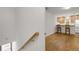 Hallway shot looking to kitchen with counter seating and modern appliances at 1020 Austin Ne Ave, Atlanta, GA 30307