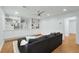 Cozy living room featuring custom built-in shelving and a comfortable couch for relaxation at 1020 Austin Ne Ave, Atlanta, GA 30307