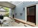 Relaxing outdoor patio featuring a grill, a cozy dining set, and entry to the home at 1020 Austin Ne Ave, Atlanta, GA 30307