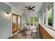Cozy screened porch with comfortable seating, a ceiling fan, and access to the outdoors at 1020 Austin Ne Ave, Atlanta, GA 30307