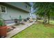 Relaxing backyard patio with comfortable seating and a charming fire pit area at 1565 Wynfield Dr, Auburn, GA 30011
