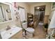 Inviting bathroom with tiled floors, a vanity, and access to a relaxing soaking tub at 1565 Wynfield Dr, Auburn, GA 30011