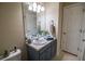Cozy bathroom featuring modern vanity, neutral color, and essential fixtures at 1565 Wynfield Dr, Auburn, GA 30011