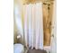 Bathroom featuring a stand up shower and a decorative shower curtain at 1565 Wynfield Dr, Auburn, GA 30011