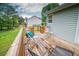 Inviting wooden deck featuring comfortable seating and scenic backyard views at 1565 Wynfield Dr, Auburn, GA 30011