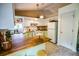Well-lit kitchen with light green cabinets, wooden countertops and a view to the exterior at 1565 Wynfield Dr, Auburn, GA 30011