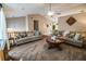 Spacious living room featuring neutral walls, carpeting and comfortable furniture at 1565 Wynfield Dr, Auburn, GA 30011