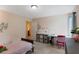 bedroom featuring a twin bed, desk, dresser, and colorful wall decorations at 161 Overlook Cir, Canton, GA 30115