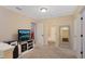 Upstairs bonus room with carpet flooring and neutral paint, perfect as a flexible living space at 161 Overlook Cir, Canton, GA 30115