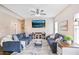 Spacious living room features two comfortable couches, modern entertainment center, and plenty of natural light at 161 Overlook Cir, Canton, GA 30115