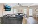 Cozy living room features a comfortable couch, large television, and an abundance of natural light at 161 Overlook Cir, Canton, GA 30115