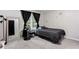 Simple bedroom features a modern fan, light gray walls, and neutral carpeting for a calming effect at 2620 Clairmont Rd, Atlanta, GA 30329