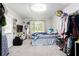 Inviting bedroom with a comfortable bed, a bright window, and personalized decor touches at 2620 Clairmont Rd, Atlanta, GA 30329
