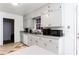 Functional kitchen featuring ample cabinet space, stainless steel appliances, and checkered flooring at 2620 Clairmont Rd, Atlanta, GA 30329