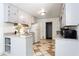 Functional kitchen featuring ample counter and cabinet space and tiled flooring at 2620 Clairmont Rd, Atlanta, GA 30329