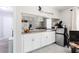 Efficient kitchenette features modern appliances, ample counter space, and neutral colors for easy maintenance at 2620 Clairmont Rd, Atlanta, GA 30329