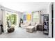 Relaxing living area with plush seating, natural light, and stylish decor creates a warm atmosphere at 2620 Clairmont Rd, Atlanta, GA 30329