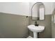 Bathroom featuring a pedestal sink and modern mirror at 3066 Quantum Ln # 24, Atlanta, GA 30341