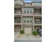 Exterior showcasing attached garages, private balconies, and modern architectural design at 3066 Quantum Ln # 24, Atlanta, GA 30341