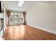 Bright living space with hardwood floors, fireplace, large window with vaulted ceiling and skylight at 3066 Quantum Ln # 24, Atlanta, GA 30341