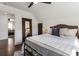 Bright bedroom with hardwood floors and rustic mirror at 978 Eden Se Ave, Atlanta, GA 30316
