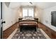 Charming bedroom with hardwood floors, ceiling fan, and ample natural light at 978 Eden Se Ave, Atlanta, GA 30316