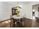 Dining area with an oval table, clear chairs, and wood floors at 978 Eden Se Ave, Atlanta, GA 30316