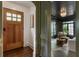 Inviting foyer showcasing hardwood floors, decorative trim, and a view into the adjacent sun-lit room at 978 Eden Se Ave, Atlanta, GA 30316