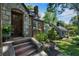 The home features a stone archway, and a brick exterior with flowers in window boxes at 978 Eden Se Ave, Atlanta, GA 30316