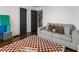 Cozy living room with a comfortable couch and accent rug at 978 Eden Se Ave, Atlanta, GA 30316