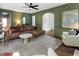 Living room with a leather sofa, patterned rug, and dark hardwood floors at 978 Eden Se Ave, Atlanta, GA 30316