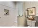 Bright shower featuring white subway tiles, glass door, and marble seat at 978 Eden Se Ave, Atlanta, GA 30316