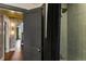 Modern shower with elegant gold fixtures and trendy green tile at 978 Eden Se Ave, Atlanta, GA 30316