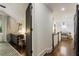 Upstairs landing area featuring neutral walls, hardwood floors, and access to the upstairs bedrooms at 978 Eden Se Ave, Atlanta, GA 30316