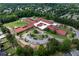 Aerial shot of a local school with a playground, parking and large athletic fields at 11569 Finley St, Suwanee, GA 30024
