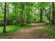 Forested backyard offers privacy and a natural setting at 11569 Finley St, Suwanee, GA 30024
