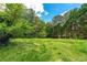 Sprawling backyard offers ample space for recreation and outdoor activities at 11569 Finley St, Suwanee, GA 30024