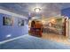 Unique bar area with custom woodwork, mural, and an enchanting atmosphere at 11569 Finley St, Suwanee, GA 30024