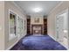 Bonus room features built-in shelves and a marble fireplace at 11569 Finley St, Suwanee, GA 30024