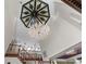 Grand foyer with a decorative chandelier and high ceilings at 11569 Finley St, Suwanee, GA 30024