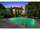 Inviting backyard pool with lush greenery, creating a private oasis for relaxation and recreation at 11569 Finley St, Suwanee, GA 30024