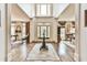 Inviting foyer with high ceilings, hardwood floors, and a decorative center table at 2111 Broadfield Run, Duluth, GA 30097