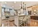 Spacious kitchen with granite counters, modern lighting and stainless steel appliances at 2111 Broadfield Run, Duluth, GA 30097