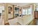 A living room featuring built-in cabinets, a fireplace, and lots of natural light at 2111 Broadfield Run, Duluth, GA 30097