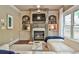 Cozy living room with built-in shelves, fireplace, and neutral color palette at 2111 Broadfield Run, Duluth, GA 30097