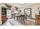 Home office featuring hardwood floors, large window, and custom built-ins at 2111 Broadfield Run, Duluth, GA 30097