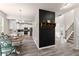 Open-concept kitchen featuring stainless steel appliances, ample countertop space and decorative black wall at 275 Creek View Place, Canton, GA 30114