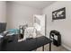 Comfortable office space featuring neutral colors, large desk, modern printer and staircase access at 275 Creek View Place, Canton, GA 30114