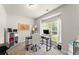 Well-lit office space featuring modern desk, neutral colors, plush rug and a large window at 275 Creek View Place, Canton, GA 30114