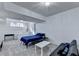 Well-lit bedroom with a soft carpet, providing a comfortable retreat for relaxation and sleep at 3075 Superior Dr, Dacula, GA 30019